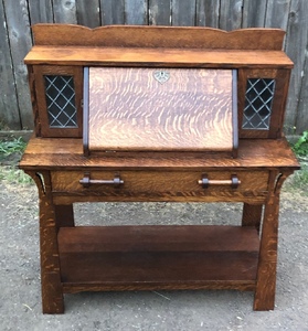 Shop of the Crafter's drop front Desk with leaded glass doors and custom wooden pulls. 
